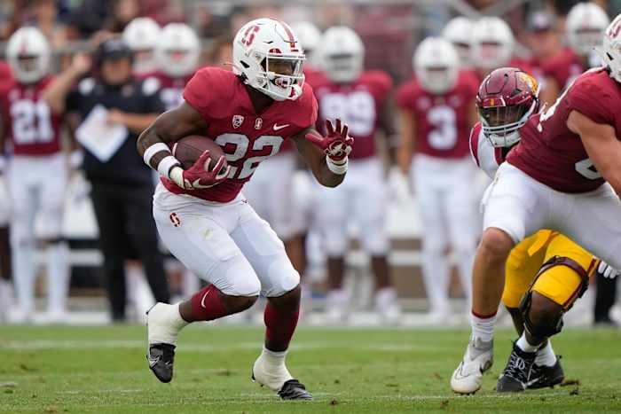Sep 10, 2022; Stanford, California, USA; Stanford Cardinal running back E.J. Smith (22) runs with the football during the first quarter against the USC Trojans at Stanford Stadium. Mandatory Credit: Stan Szeto-USA TODAY Sports